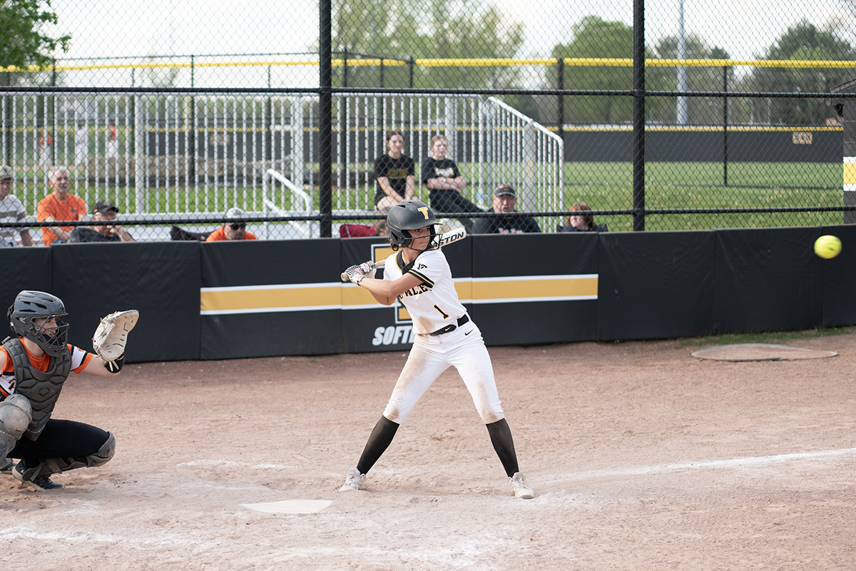 Cydnee Wolford preparing to hit the ball into left field against New Lexington