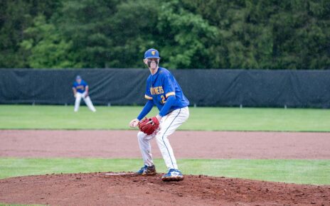 Maysville's Jake Deal getting ready to deliver a pitch to John Glenn.