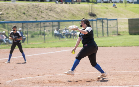 Zanesville's Katie Brooks fires off a pitch against Cambridge