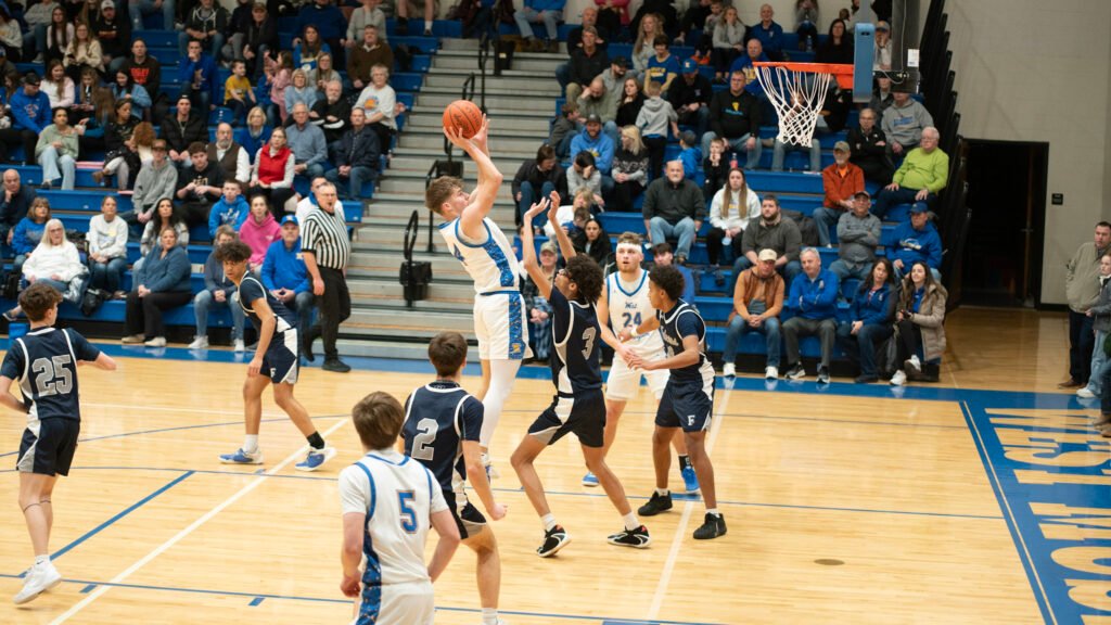 West Muskingum senior Kyle Porter shoots over Fairless