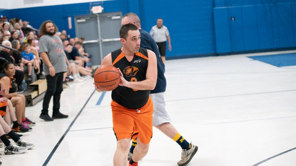 No 3 for the Tigers passed the ball in the annual game against the Zanesville Fire Department